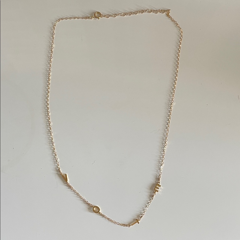 Elegant “VOTE” necklace
